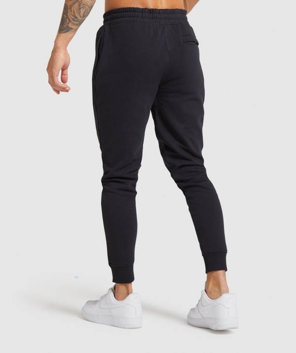 Panske Joggers Gymshark Crest Čierne | PI0852617